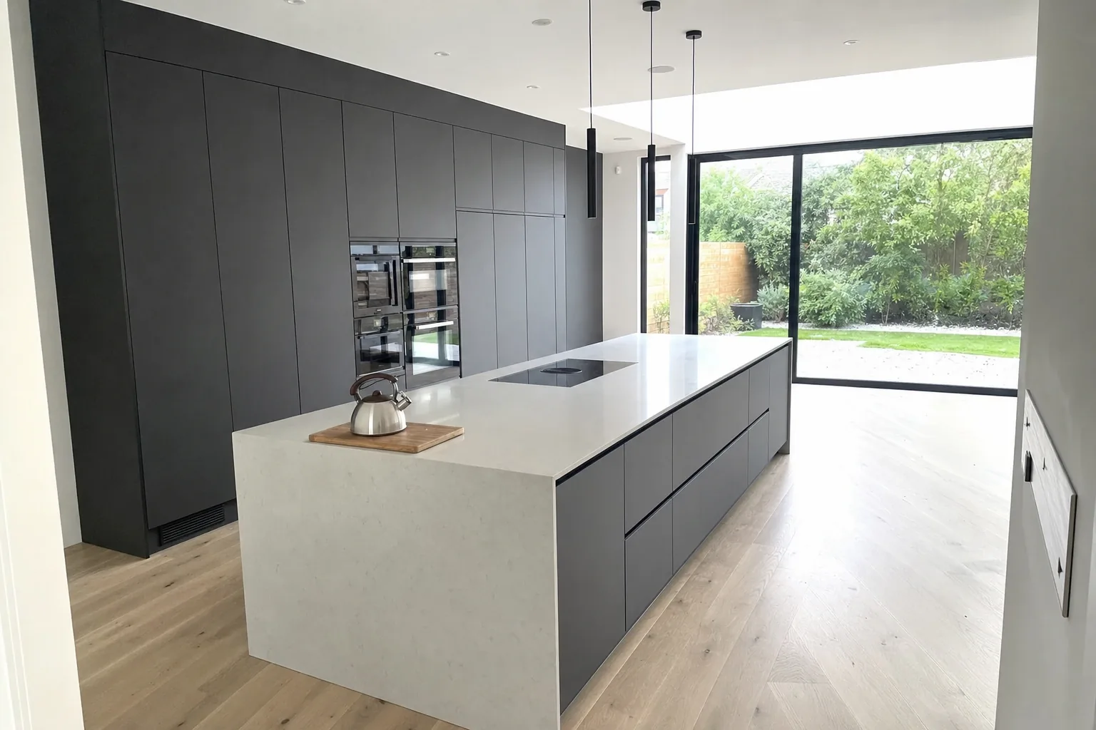 Handleless graphite island kitchen